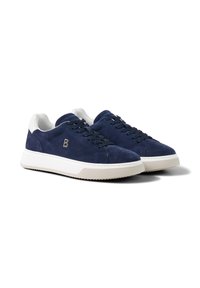 Navy blue suede sneakers with white thick rubber soles, navy laces, and a white heel collar, displayed at a slight angle.
