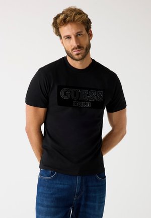 - T-shirt z nadrukiem