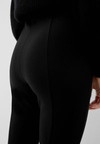 s.Oliver MIT FUSSSCHLAUFE - Legging - schwarz