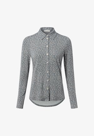 Lange mouwen button-up shirt in het blauw met een bloemmotief. Kenmerkt zich door een puntige kraag en een gebogen zoom. Gemaakt van een lichtgewicht stof.