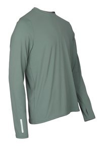 Långärmad skjorta i mjukt, dämpat grönt tyg. Har rund halsringning och reflexdetaljer på ärmarna. Slät textur, avslappnad passform.