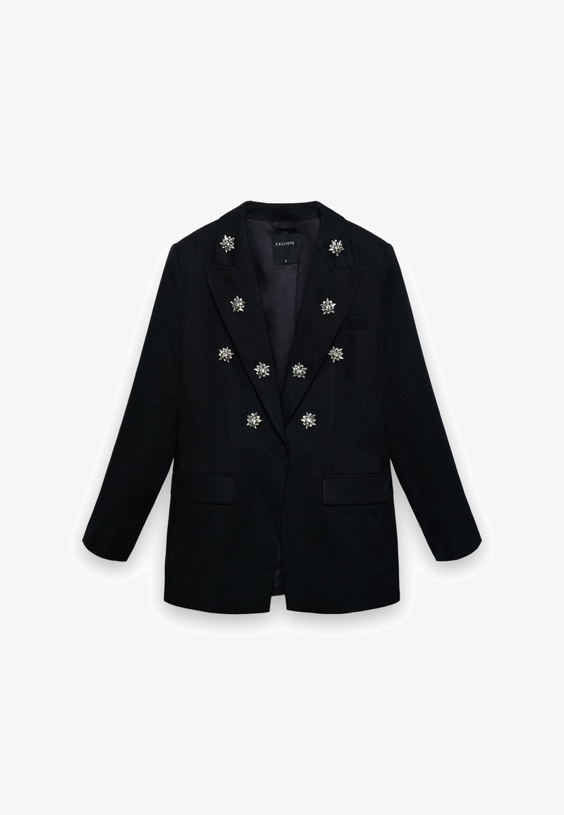 Blazer nero doppiopetto con decorazioni di spille floreali argentate e tasche con pattina, etichettato taglia piccola.