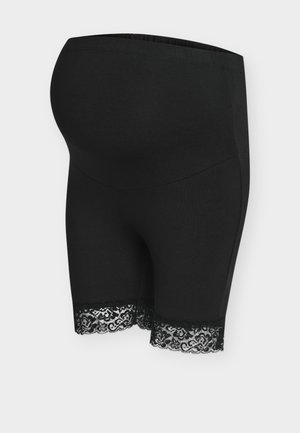 Pantaloncini premaman neri realizzati in tessuto elasticizzato, con vita alta e bordo in pizzo sull'orlo per un dettaglio aggiuntivo.