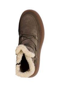 Bruine suède laars met een fluffy witte bontvoering en een donker rubberen zool, met veters en zijaccenten. De bovenaanzicht toont de ronde vorm.