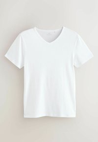 Fehér rövid ujjú póló V-nyakú kialakítással. Simogató pamut anyagból készült, egyszerű, letisztult formával, minta nélkül.
