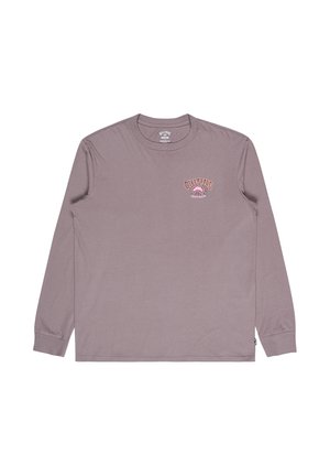 T-shirt à manches longues en coton mauve muted. Présente un logo graphique rose sur la poitrine et des poignets côtelés. Coupe classique avec un col rond.