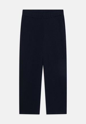 Granatowe, szerokie spodnie z elastycznym paskiem w talii i kieszeniami po bokach. Gładki materiał o czystym, minimalistycznym designie. Brak widocznych wzorów.