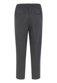 Pantalon gris à taille élastique avec une jambe fuselée. Dispose de deux poches arrière et d'un tissu lisse, léger avec un léger réflecteur.