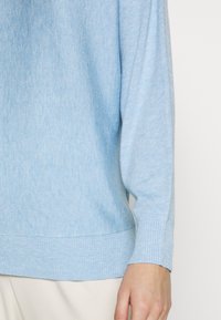 Culture Neule - light blue