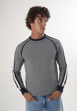 - Sweter