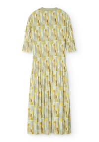 Plisované šaty ve světlé zelené barvě s vzorovaným designem žlutých, hnědých a bílých abstraktních tvarů. Krátké rukávy a kulatý výstřih.