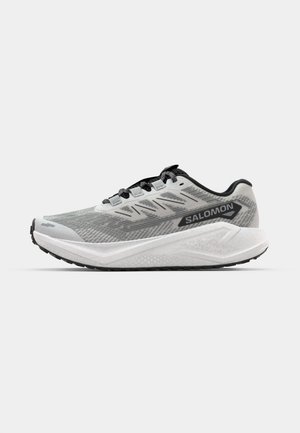 Gray running shoe with a mesh upper, black accents, and a white midsole. Features reinforced toe and flat laces for secure fit.