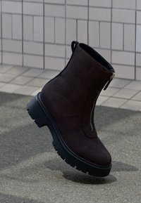 Selected, dark brown