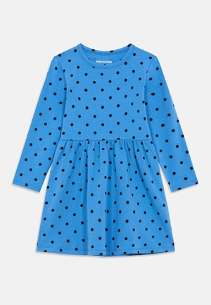 Rochie albastră cu mâneci lungi, având un bust ajustat, fustă evazată și buline negre pe întreaga suprafață. Fabricată dintr-un material moale și respirabil.