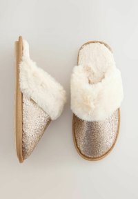 Glittering gold and silver slippers with a plush white faux fur cuff and soft inner lining. Flat sole with textured detailing.