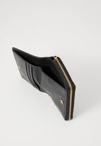 Black leather wallet with gold zipper, featuring multiple card slots and a textured surface, designed for compact organization.