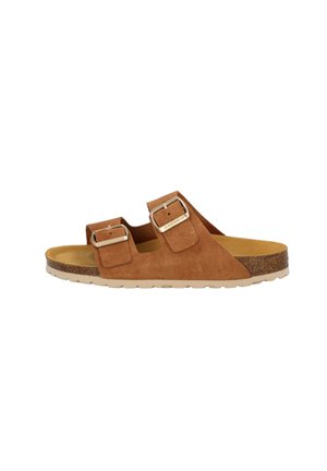Braune Wildleder-Sandale mit zwei verstellbaren Schnallenriemen, strukturiertem Fußbett und einer hellen Korksohle. Minimalistisches Design.