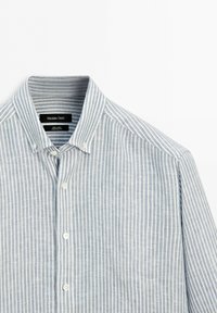 Men's long-sleeve button-up shirt with white and gray vertical stripes and a button-down collar, made of 100% linen by Massimo Dutti.