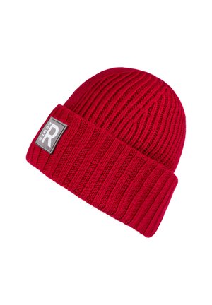 Red knitted beanie hat with ribbed texture, featuring a folded cuff and a rectangular gray patch with a logo detail.
