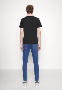Tommy Jeans Jeans Skinny Fit - blue denim