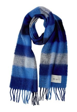 Blau und grau gestreifter weicher Wollschal mit fransigen Enden und einem weißen Etikett mit der Aufschrift "oui" auf einer Seite.