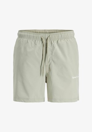 Jasnobeżowe męskie spodenki kąpielowe z elastycznym pasem i sznurkiem, z małym białym logo na lewej nogawce.