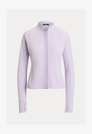 Gaiši violeta sporta jaka no gludas auduma, ar augstu apkakli, pilnu rāvējslēdzēju un sānu kabatām ar pieguļošiem rokturiem.