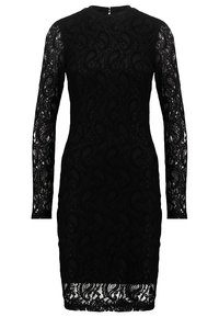 Robe en dentelle noire à manches longues, avec un motif paisley et une silhouette cintrée. Col montant et ourlet arrivant au genou. Fermeture éclair au dos.