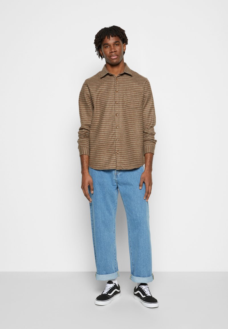 Carhartt WIP LANDON PANT - Relaxed fit jeans - blue heavy stone 
