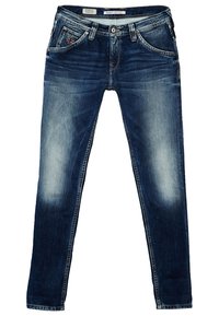 Tajta jeans i mörkblå denim, med blekning vid låren, fem fickor och en märkesetikett på midjan.