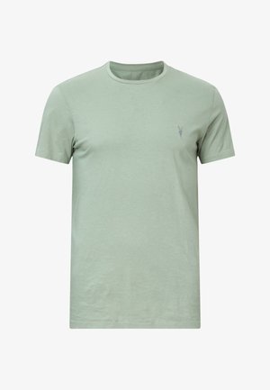 Lichtgroene katoenen t-shirt met een ronde hals, korte mouwen en een klein geborduurd logo op de linkerkant van de borst. Glad textuur, eenvoudig ontwerp.