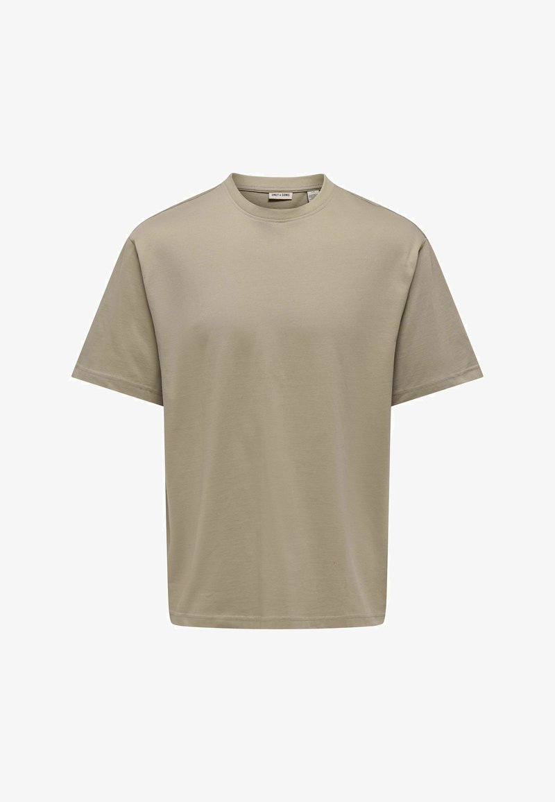 T-shirt beige à manches courtes, col rond, en coton, coupe régulière avec étiquette de marque visible à l'intérieur du col.
