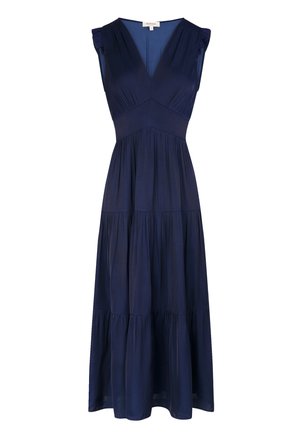 Mouwloze marineblauwe maxi-jurk met diepe V-hals, getailleerde taille, gelaagde rok en subtiele ruches aan de schouderbanden.