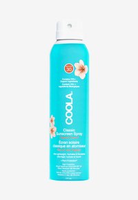 Aerozolowa butelka z niebieskim odcieniem, oznaczona "Coola Classic Sunscreen Spray", z białą nakrętką, akcentami tropikalnych kwiatów i informacją o SPF 30.