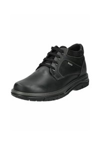 Chaussures en cuir noir avec un bout arrondi, un design à lacets, un col rembourré, des coutures blanches contrastantes et une semelle en caoutchouc texturée.