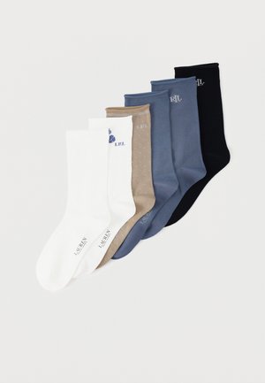 Cinq paires de chaussettes mi-mollet en blanc, beige à pois, deux nuances de bleu et noir, chacune avec une discrète broderie du logo "LRL" près du haut.