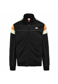 Chaqueta negra con cierre y detalles en naranja y crema. Presenta un cuello alto, puños acanalados y un logo en el pecho. Tejido suave.