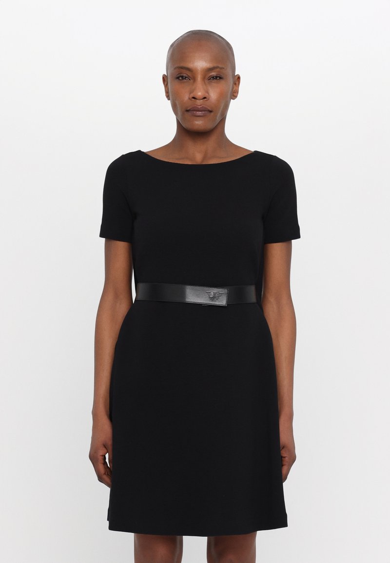 Black short-sleeve dress with a fitted shape and round neckline, featuring a thin black leather belt with a logo accent at the waist.