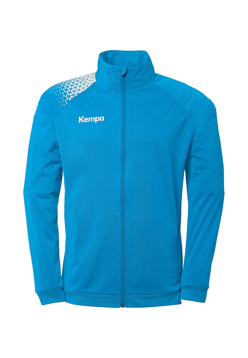 Blauwe zip-up jas met een hoge kraag, voorzien van een geometrisch patroon op de schouder en het 'Kempa' logo op de borst. Glad textuur.