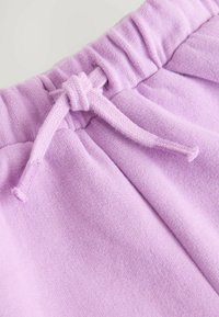 Next REGULAR FIT  - Träningsbyxor - lilac purple