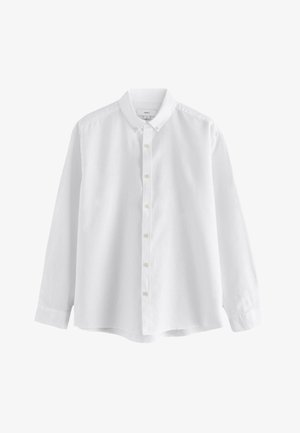 Chemise blanche à manches longues avec col classique et poignets boutonnés, présentée sur un fond blanc uni.