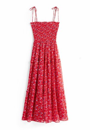 Czerwona maxi sukienka w kwiaty z marszczonym gorsetem, cienkimi ramiączkami i warstwowym dołem, wykonana z lekkiego, zwiewnego materiału z delikatnym wzorem floralnym.