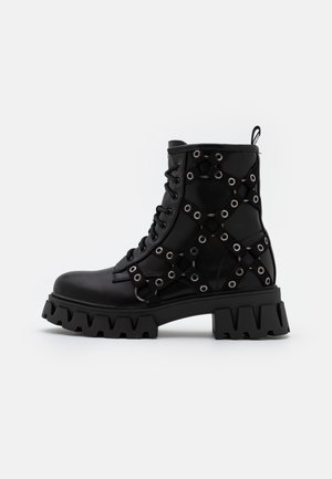 NEXOS HARNESS - Lace-up ankle boots - black