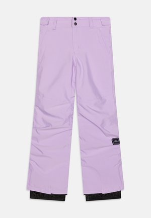 Light purple ski pants with a smooth texture, wide legs, and black accents at the cuffs. Features two front pockets and a sewn logo patch.
