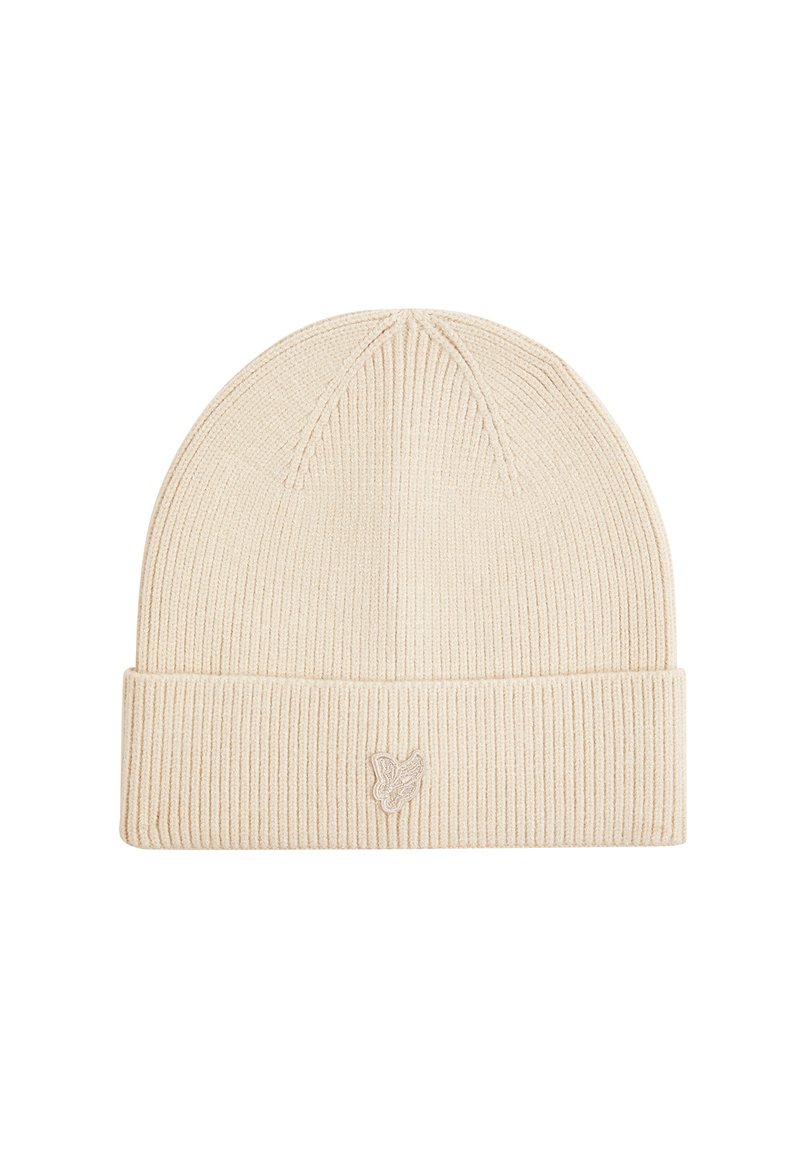 Beige ribbelbrei muts met een omgeslagen rand. Heeft een subtiele geborduurde vlinderlogo aan de voorkant. Zachte textuur, aansluitend ontwerp.