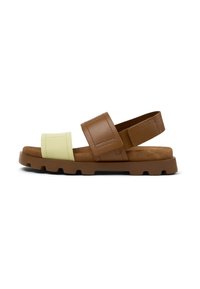 Brown and yellow two-tone sandals with a wide strap and textured sole, featuring adjustable ankle strap and cushioned footbed.