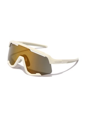 White sports sunglasses with a large brown tinted lens, angular design, and prominent side frames. Features the brand "Hawkers" on the side.
