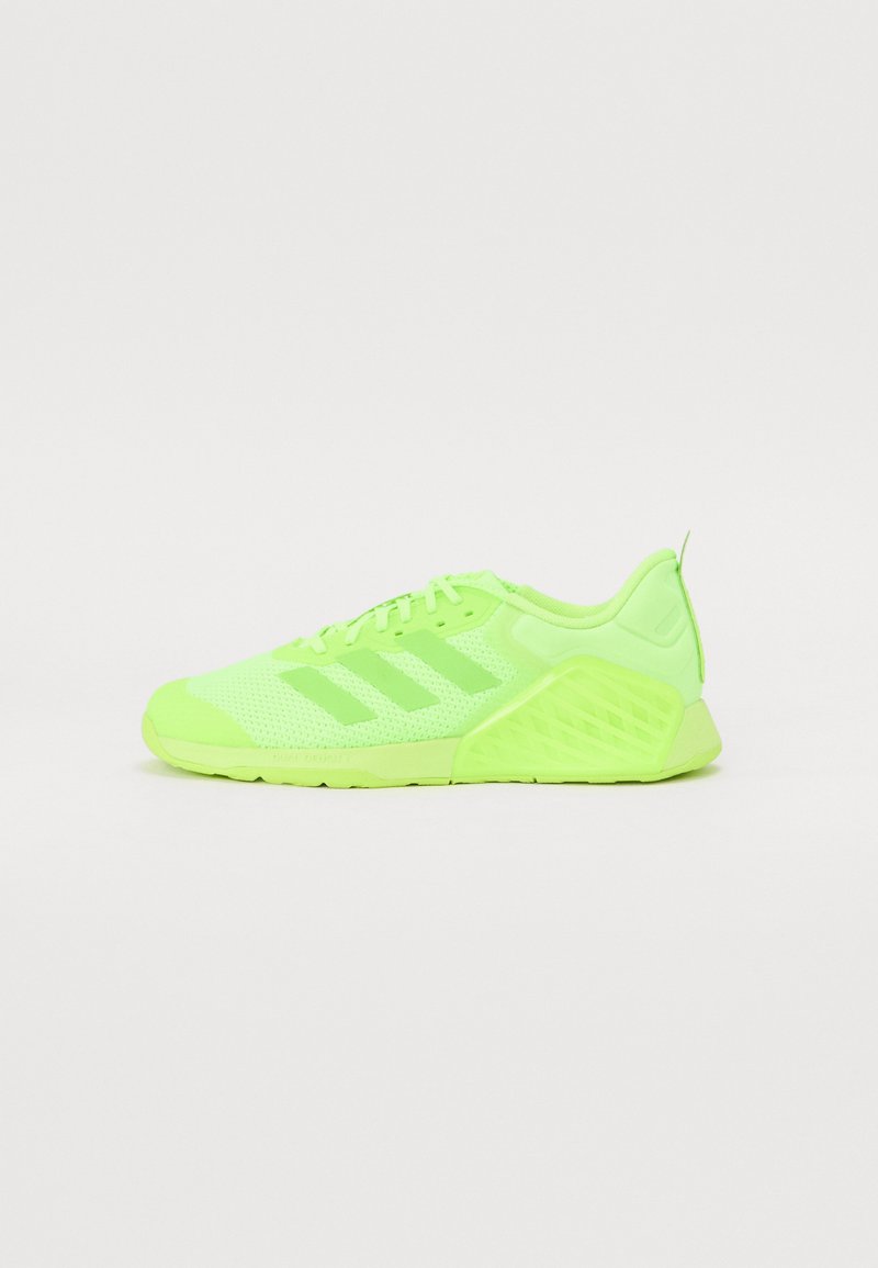 Neon green athletic shoes with mesh upper, three stripes design on the side, textured heel, and flexible rubber sole for traction.