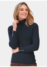 Marineblauer, gerippter Rollkragenpullover mit langen Ärmeln und drei dekorativen Knöpfen an den Bündchen, aus einem weichen Strickstoff gefertigt.