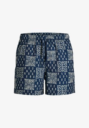 Granatowe kąpielówki ze wzorami białych kwiatów i geometrycznych bloków, elastycznym pasem i sznurkiem z przodu.